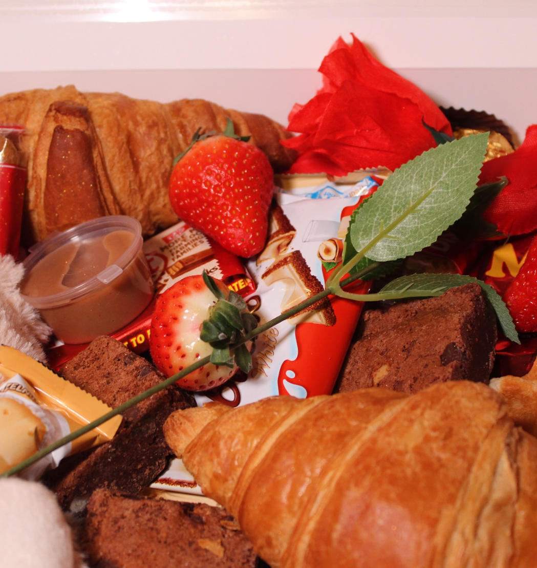 Heavenly Cuisine UK treat box with croissants, brownies, strawberries and chocolates